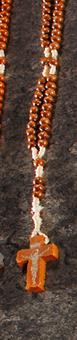 Holy Rosary, 
with dark wooden pearls
crucifix with golden print 